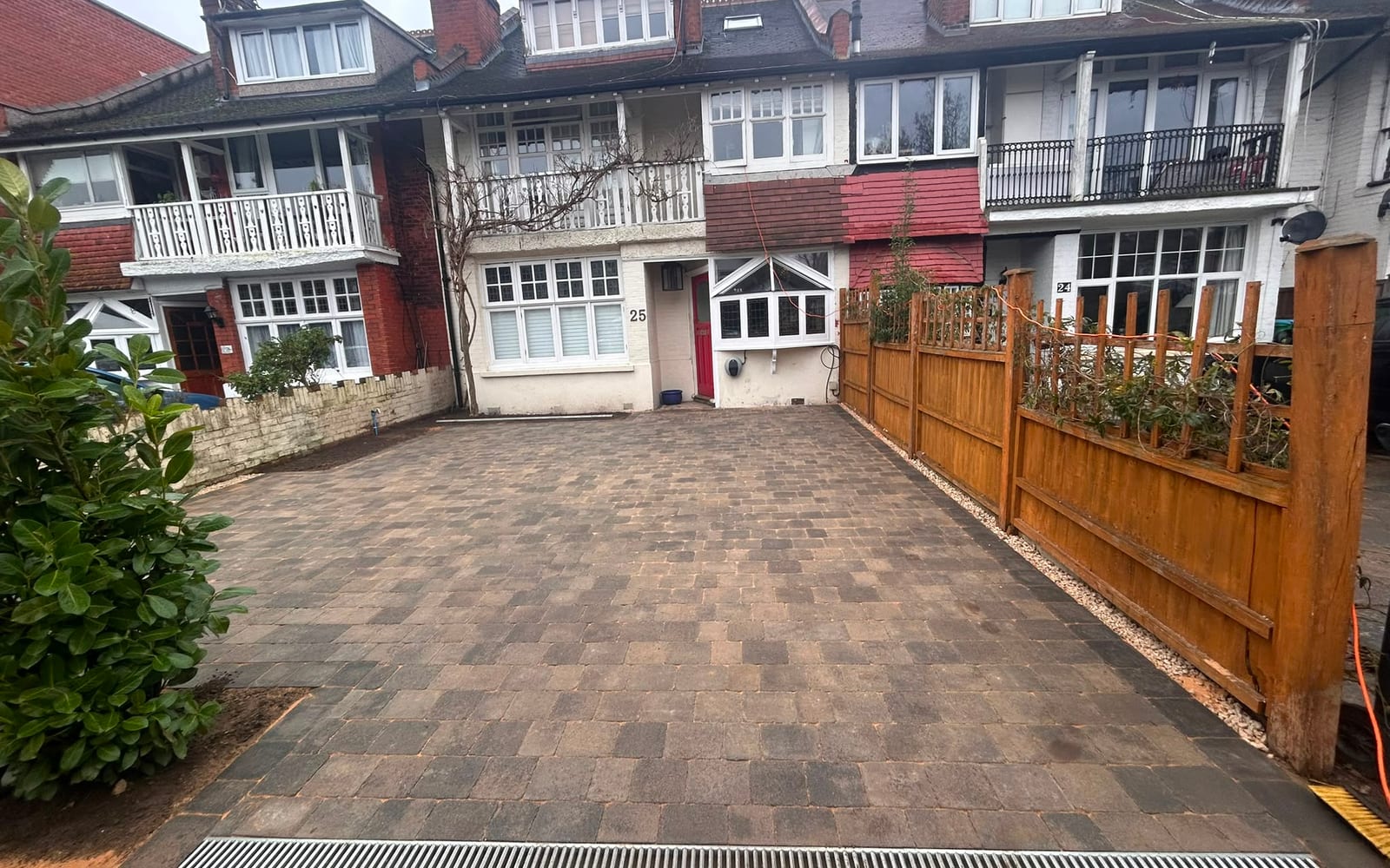 The finished block paving driveway with a drainage channel by Hills Driveways & Patios